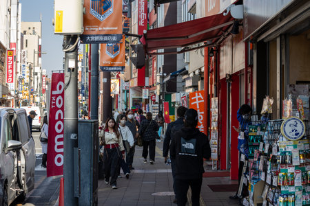 Tokyo, Japan, November 3, 2023: Bustling street scene in Asakusa with pedestrians and shopsのeditorial素材