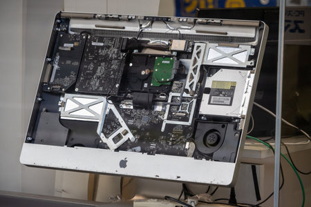 Tokyo, Japan, November 3, 2023: Disassembled Apple computer showing internal componentsのeditorial素材
