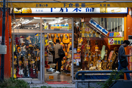 Tokyo, Japan, November 3, 2023: Music Store Display with Variety of Instrumentsのeditorial素材