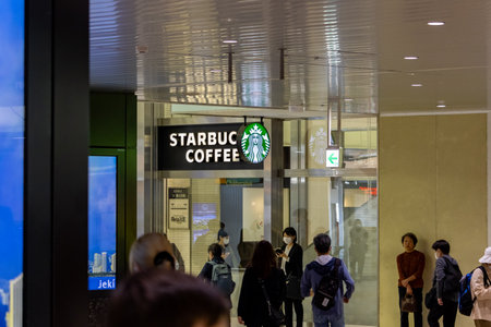 Tokyo, Japan, November 3, 2023: Customers entering a Starbucks Coffee shopのeditorial素材