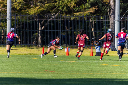 Tokyo, Japan, November 4, 2023: Intense Women's Rugby Game in Action on a Sunny Dayのeditorial素材