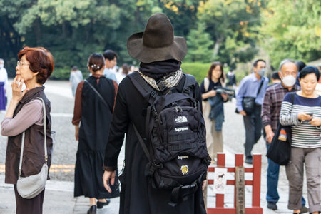 Tokyo, Japan, November 3, 2023: People walking and interacting in a public parkのeditorial素材