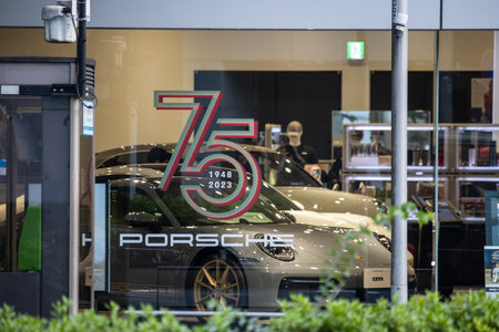 Tokyo, Japan, November 4, 2023: Porsche 75th Anniversary Edition Displayed in Showroomのeditorial素材