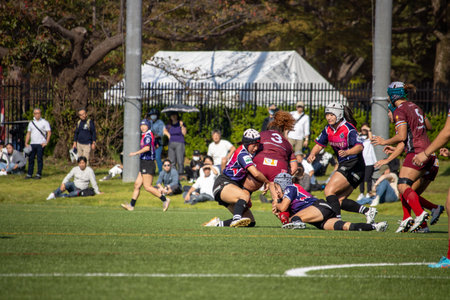 Tokyo, Japan, November 4, 2023: Intense Women's Rugby Match on a Sunny Dayのeditorial素材