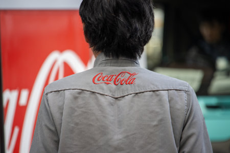 Tokyo, Japan, November 4 2023: Embroidered Coca-Cola Logo on Suit Jacketのeditorial素材