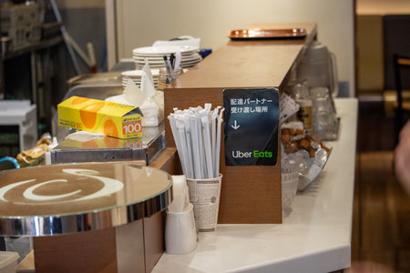 Tokyo, Japan, November 4 2023: Uber Eats sign in a restaurantのeditorial素材