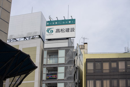 Tokyo, Japan, November 4, 2023: Urban landscape with corporate signageのeditorial素材