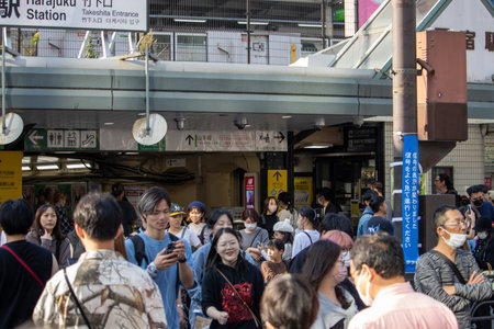Tokyo, Japan, November 4 2023: Bustling street scene outside Harajuku Stationのeditorial素材