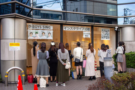Tokyo, Japan, November 4 2023: Fans queuing for a pop concertのeditorial素材