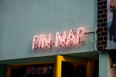 Tokyo, Japan, November 4 2023: Neon Sign "PIN NAP" on a Building Exteriorのeditorial素材