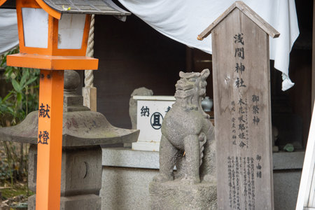 Tokyo, Japan, November 4 2023: Shinto Shrine Entrance with Guardian Statueのeditorial素材