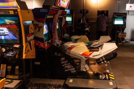 Tokyo, Japan, November 5 2023: Arcade gaming center with racing simulation gamesのeditorial素材