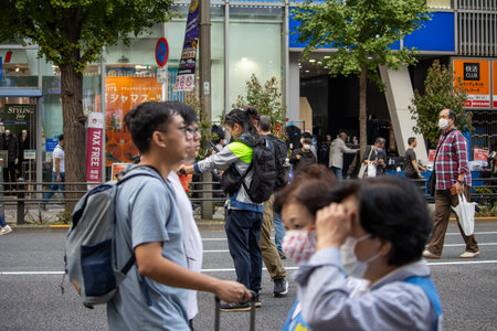 Tokyo, Japan, November 5 2023: Bustling Street Scene with Pedestriansのeditorial素材