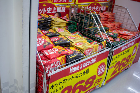 Tokyo, Japan, November 5 2023: Branded Snack Display at Japanese Storeのeditorial素材