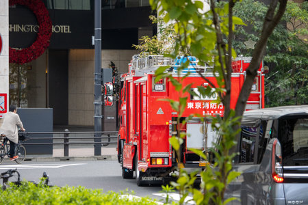 Tokyo, Japan, November 5 2023: Red Firetruck Parked on Street