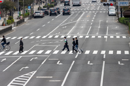 Tokyo, Japan, November 5 2023: Pedestrians crossing a busy intersectionのeditorial素材