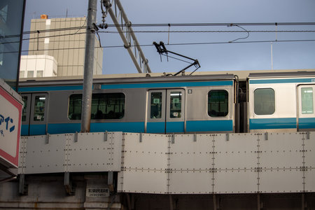 Tokyo, Japan, November 5 2023: Commuter Train at Stationのeditorial素材