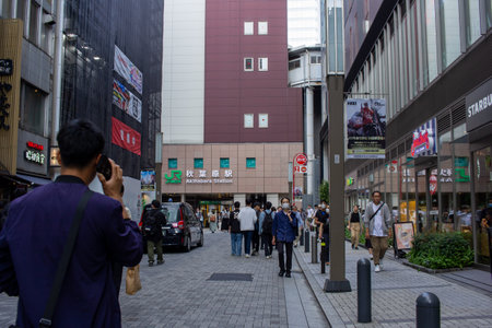 Tokyo, Japan, November 5 2023: Busy Street in Akihabara with Passersby and Shop Signageのeditorial素材