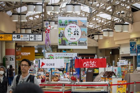 Tokyo, Japan, November 5 2023: Indoor Market Scene with Colorful Banners and Food Stallsのeditorial素材