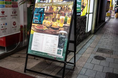 Tokyo, Japan, November 6 2023: Menu board outside Japanese pubのeditorial素材