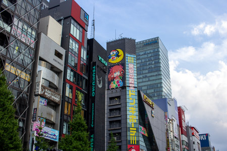 Tokyo, Japan, November 5 2023: Vibrant Urban Scene with Colorful Billboards and Modern Architectureのeditorial素材