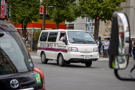 Tokyo, Japan, November 6 2023: Mizusu Coffee Delivery Van on the Streetのeditorial素材