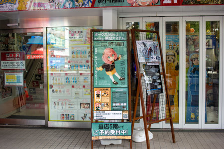 Tokyo, Japan, November 6, 2023: Anime advertisement at a Japanese storefrontのeditorial素材