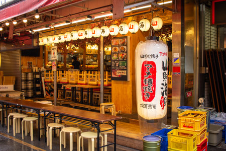 Tokyo, Japan, November 6, 2024: Traditional Japanese Izakaya at Nightのeditorial素材