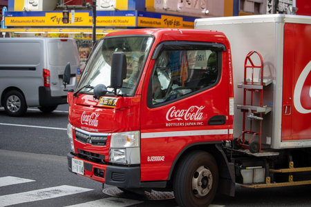 Tokyo, Japan, November 6, 2023: Coca-Cola delivery truck in urban settingのeditorial素材