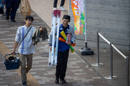 Tokyo, Japan, November 7, 2024: Urban Street Scene with Pedestriansのeditorial素材