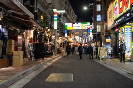 Tokyo, Japan, November 7, 2024: Bustling Night Shopping Districtのeditorial素材