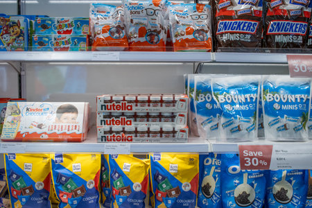 Helsinki, Finland, November 8, 2024: Assortment of International Chocolate Brands on Store Shelvesのeditorial素材
