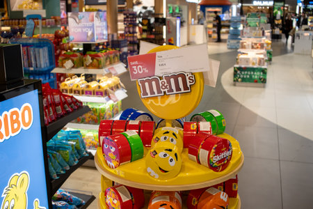 Helsinki, Finland, November 8, 2024: Candy Display in Airport Duty-Free Shopのeditorial素材