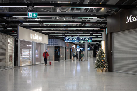 Helsinki, Finland, November 8, 2024: Closed Retail Shops in Airport Terminal