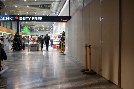 Helsinki, Finland, November 8, 2024: Duty Free Shopping Area in Helsinki Airport