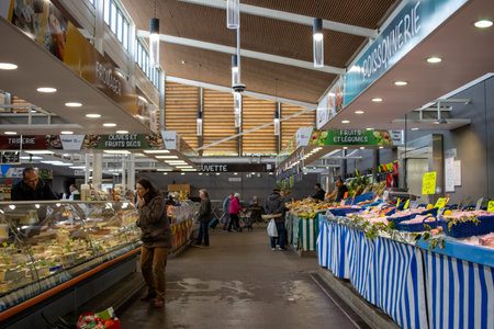 Paris, France, November 9, 2024: Indoor Market Stalls with Fresh Produce and Seafoodのeditorial素材