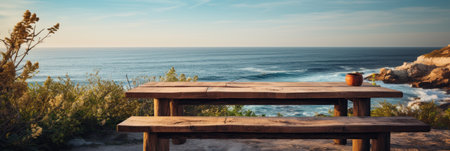 Wooden empty table close-up on the background of blurred sea, concept of vacation by the sea, bannerの素材