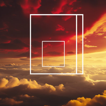 Square frame against blue and orange sky over clouds at sunset with sunの素材