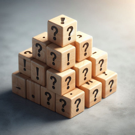 Wooden blocks with question marks on a gray background. Concept of solving problems.