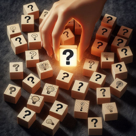 Hand of businesswoman arranging wooden cube with question mark and light bulbの写真素材