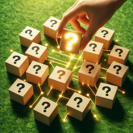 Conceptual image with question marks on wooden cubes on green grassの写真素材