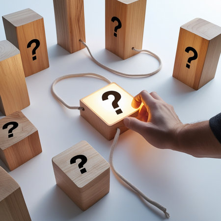 Man hand choosing wooden cube with question mark on white background. FAQ conceptの写真素材