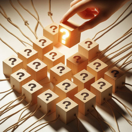 Conceptual image with wooden cubes with question marks and human handの写真素材