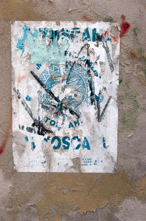 Street art - posters torn down, stuck togetherの写真素材