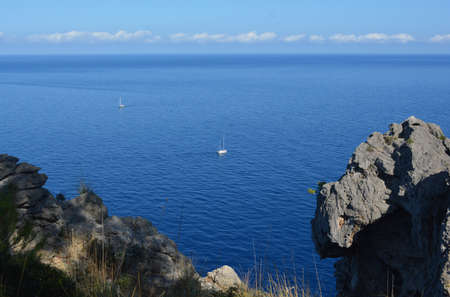 Sailing boats on the sea - hike from San Augustine to Port de SÃ³ller, Mallorca, Spainの写真素材