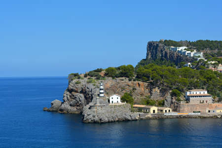 Lighthouses at the harbor entrance to Port de SÃ³ller, Mallorca, Spain