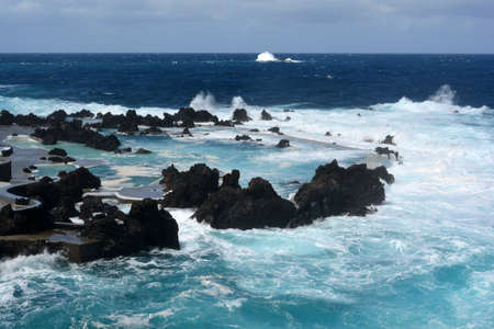 Roaring surf on the coast of Porto Moniz, Madeira, Portugalの写真素材