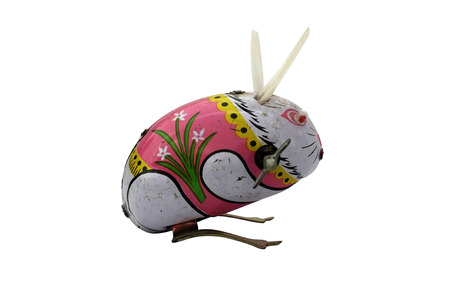 Wind-up vintage toy rabbit isolated on white backgroundの写真素材