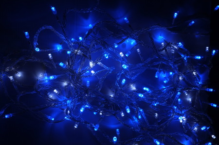 Blue lighting background, blue decorative garlandの写真素材