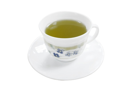A white ceramic cup of green tea isolated on white backgroundの写真素材